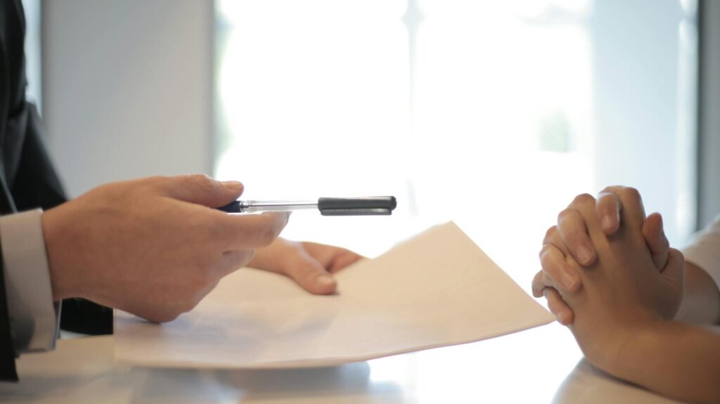 A process server serving papers.